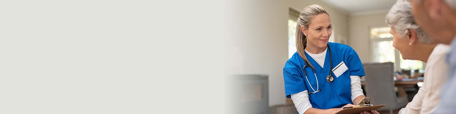 A nurse talking with residents